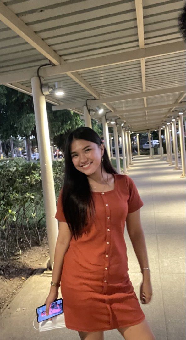 Button-Down Dress (Category: Dresses) located in Mansalay. Submitted by declutterandco (Listing ID 1424802667, Image 1). Description: Dress features a button-down design and short sleeves. It has a square neckline and a slit at the bottom. It is a knee-length dress..