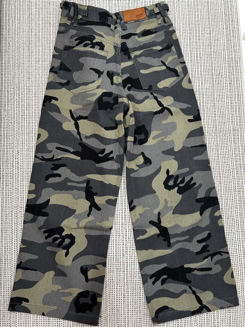 Camouflage Wide Leg Jeans (Category: Jeans) located in Quezon City. Submitted by christianramirez (Listing ID 1424738403, Image 2). Description: Waist 26 inches Length 37 inches Leg opening 10.5 inches Used only once for fitting.
