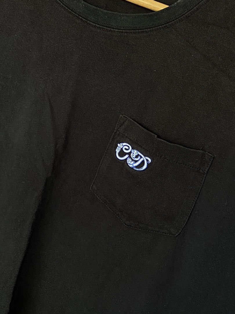 Christian Dior Logo Shirt (Category: Tshirts & Polo Shirts ) located in Bacolod City. Submitted by PSGTHRIFTIES (Listing ID 1424768727, Image 2). Description: Good condition Need wash Size L on tag best fits M Dimensions:22.5x25.5 DM.