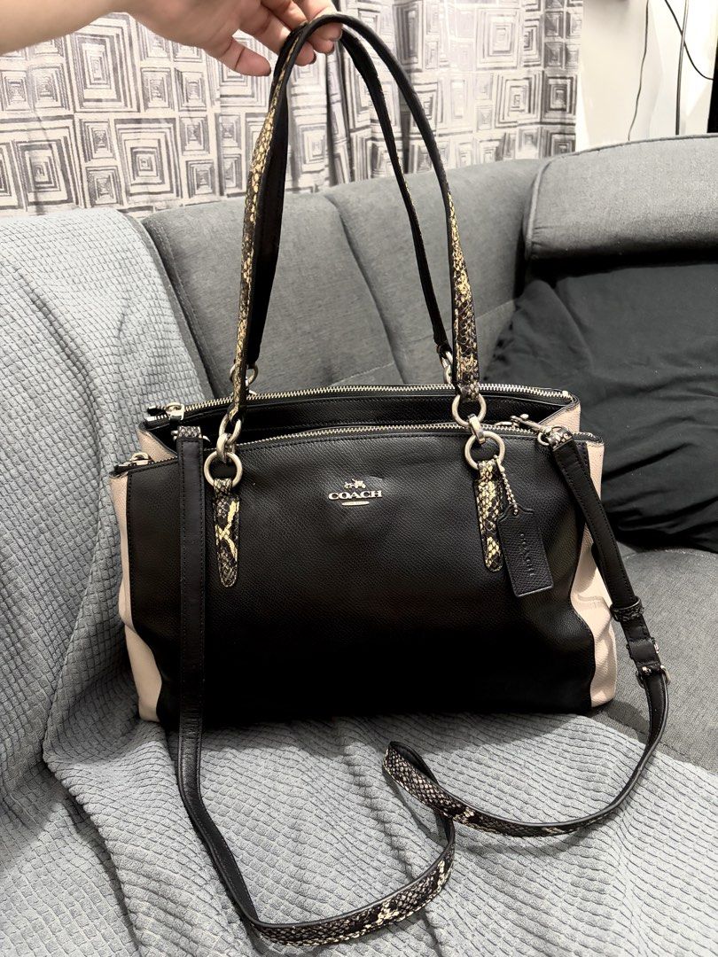 Coach Exotic Trim Christie Carryall (Category: Shoulder Bags) located in San Juan City. Submitted by dbprelovedlux (Listing ID 1424829600, Image 1). Description: - Coach Exotic Trim Christie Carryall - Black and nude color - Snakeskin detailing on handles and detachable shoulder strap - Includes Coach tag - Zipper closure, all ykk zips - Silver hardware - made in vietnam Flaws: signs of use on hardwares, some rubber lining press marks on straps, 