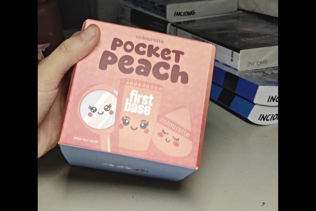 COLOURETTE POCKET PEACH BLIND BOX FRESH PULL (Category: Makeup) located in Paranaque City. Submitted by iloveem (Listing ID 1424722971, Image 2). Description: Colourette Pocket Peach First Base set. It includes a compact with a mirror, a first base product, and a sponge. The set comes in a peach-colored box. There is also a small, peach-colored pouch with a makeup palette inside. The pouch has a cute embroidered face..