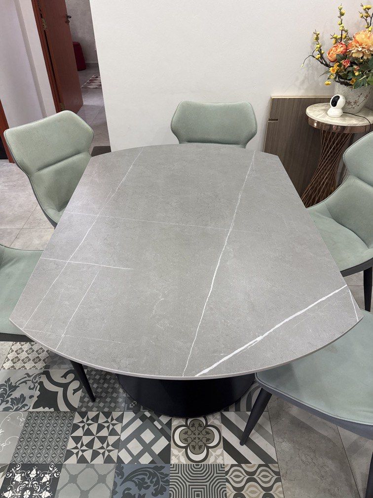 Dining Table (Category: Tables & Sets) located in Singapore. Submitted by gentlemensvaletsg (Listing ID 1424756221, Image 3). Description: About 50kg Very good condition 6x chairs very strong legs material is washable Can covert into smaller table about 1.2 m see picture for more info Price can nego don’t worry. Need to move fast !! ($30 per Chairs if sold separately).