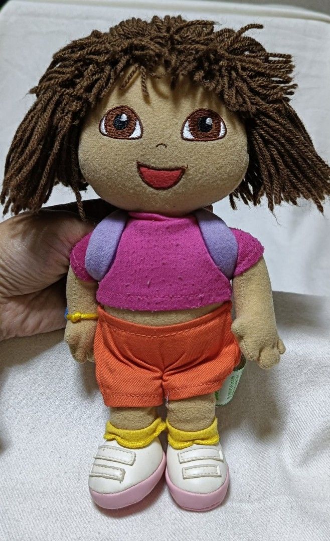 Dora the Explorer Plush Doll (Category: Plushies & Soft Toys) located in Baguio. Submitted by boxmania (Listing ID 1424731295, Image 2). Description: Plush - Dora the Explorer From HK/UK/Dubai/Canada or Japan Surplus Box What you see is what you get No return, no exchange (random item po nakukuha ng seller sa box).