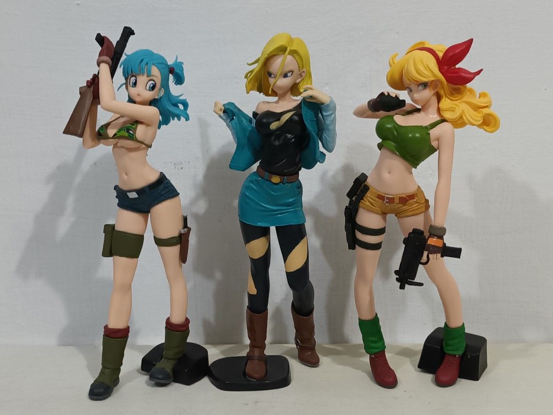 Dragon Ball Z Female Characters Set (Category: Figurines & Statues) located in Bacoor. Submitted by donlopezart (Listing ID 1424757500, Image 1). Description: Set of three Dragon Ball Z figures featuring female characters. Includes Bulma, Android 18, and Launch. Each figure is posed with a weapon. The figures are standing on individual bases. The characters are wearing different outfits. The figures are painted with vibrant colors. Size: approx 2