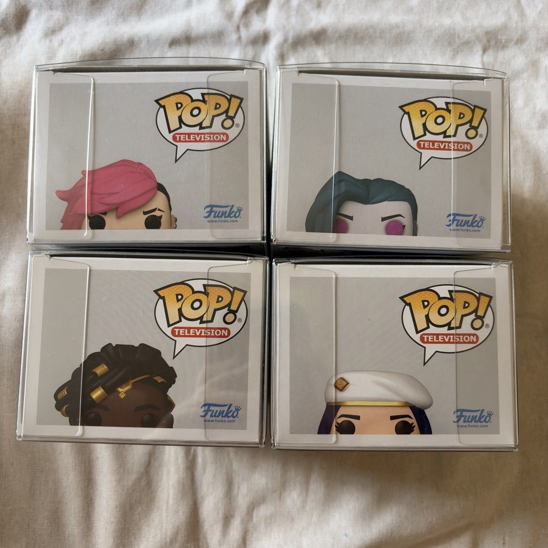 Funko Pop! Arcane Figures - Vi, Jinx, Mel, Caitlyn (Category: Designer & Blind Box Toys) located in Silang. Submitted by delulubean (Listing ID 1424715027, Image 2). Description: Funko Pop! Arcane Figures - Vi, Jinx, Mel, Caitlyn - Original and NOOB - Comes with Protectors - Lalamove or J&T delivery (c/o buyer) - Gcash Payment 📍Silang, Cavite.