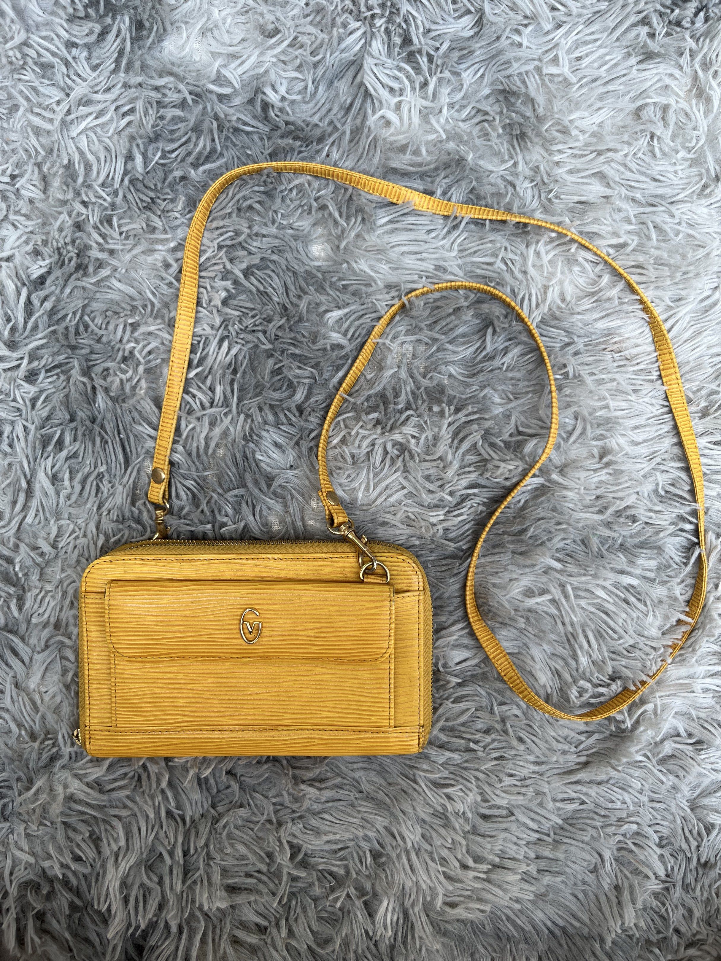 GIANNI VALENTINO SHOULDER WALLET BAG (Category: Luxury Bags & Wallets) located in Bulacan. Submitted by letsfindukaywithme (Listing ID 1424713814, Image 1). Description: Gianni Valentino shoulder wallet bag This wallet has no major flaws & damage Minimal scratches only and still presentable -8 card slots -1 coin slot - 6 interior pockets -2 exterior pockets Removable strap with gold hardware Leather material +sf payment first Ship via J&T.
