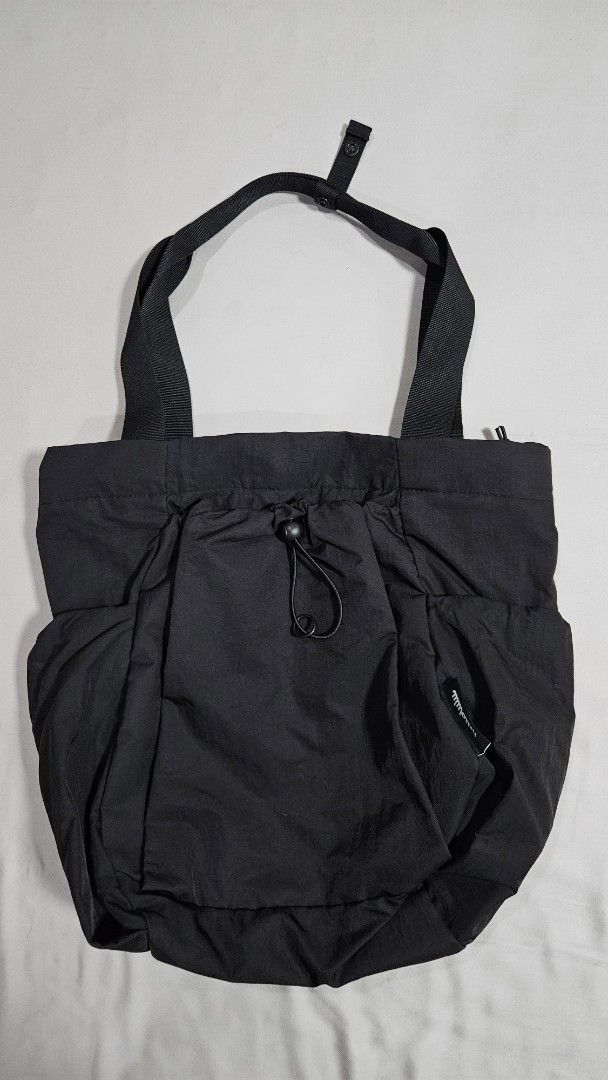 Hellolulu Reon All Day Tote Bag - Black Onyx (Category: Tote Bags) located in Taguig. Submitted by katccloset (Listing ID 1424725758, Image 1). Description: Hellolulu Beon All Day Tote Bag in Black Onyx. Includes a separate pouch. Features a drawstring closure on the front pocket and a zippered main compartment. The bag has a capacity of 18L and is made from 100% recycled PET with a water-repellent coating. Made in China. used once mop gcash or u