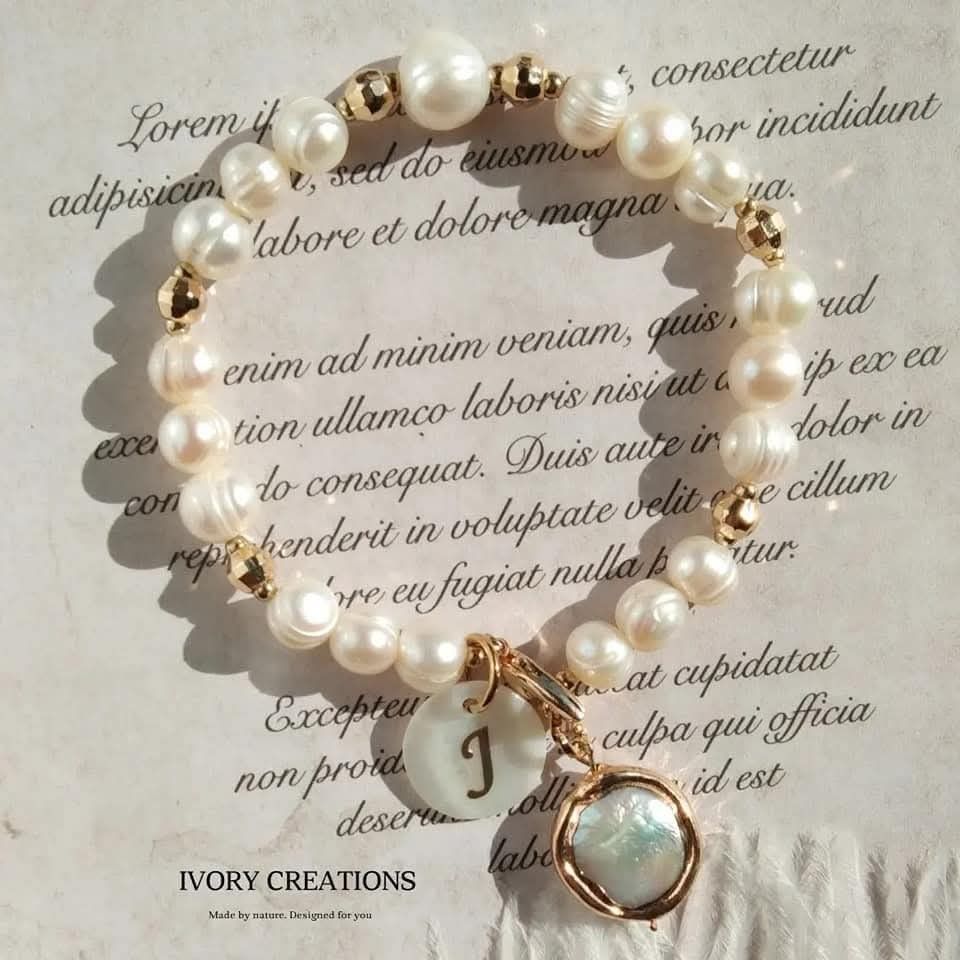 Ivory Creations Pearl Bracelet with Initial Charm (Category: Bracelets) located in Valenzuela. Submitted by ivorycreations (Listing ID 1424733027, Image 1). Description: Genuine pearls with personalized initial pendant .