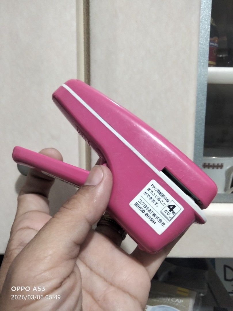 Kokuyo Harinacs Staple-Less Stapler (Category: Stationery & School Supplies) located in Carmona. Submitted by rpute (Listing ID 1424877375, Image 3). Description: Pink Kokuyo Harinacs staple-less stapler. The stapler is designed to bind papers without the need for staples. It has a simple, ergonomic design for easy use. The images show the stapler from various angles, highlighting its features and design..