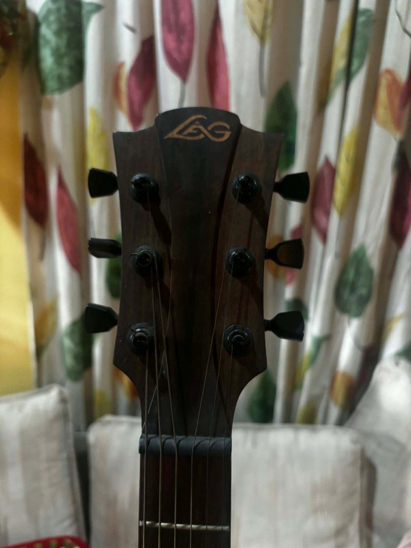 LAG Tramontane Acoustic Electric Guitar (Category: Musical Instruments) located in Cabuyao City. Submitted by cy_127 (Listing ID 1424810593, Image 2). Description: LAG Tramontane T400DCE Acoustic-Electric Guitar Well Maintained Message me for more details and if you’re interested. 😊.