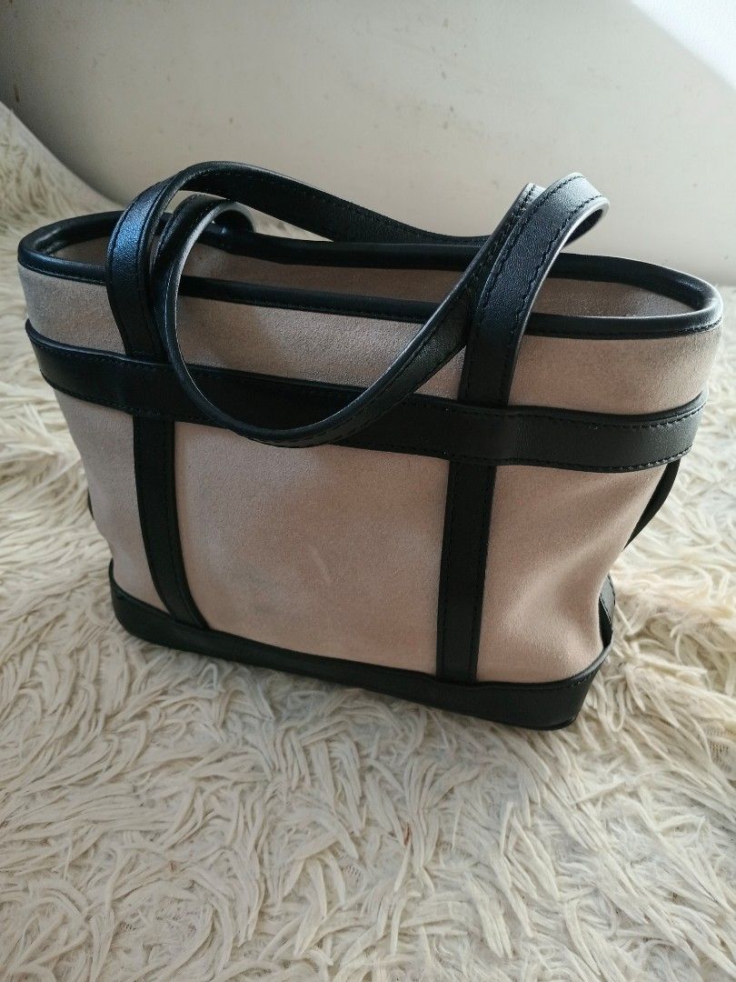 Loewe Mini Suede Anagram Tote (Category: Luxury Bags & Wallets) located in Paranaque City. Submitted by raenjavi (Listing ID 1424819845, Image 3). Description: - Loewe Mini Suede Anagram Tote - Crafted from luxurious suede material - Features elegant black leather trim and handles - Showcases the iconic Anagram logo - Mini size, perfect for daily use Last pic for Price Reference .