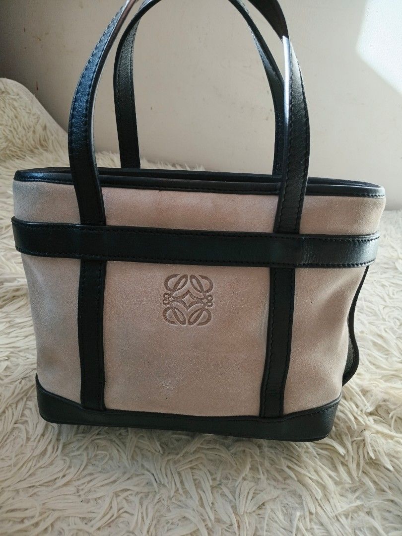 Loewe Mini Suede Anagram Tote (Category: Luxury Bags & Wallets) located in Paranaque City. Submitted by raenjavi (Listing ID 1424819845, Image 1). Description: - Loewe Mini Suede Anagram Tote - Crafted from luxurious suede material - Features elegant black leather trim and handles - Showcases the iconic Anagram logo - Mini size, perfect for daily use Last pic for Price Reference .