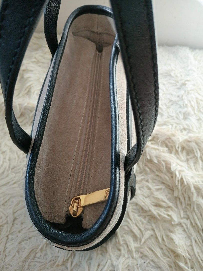 Loewe Mini Suede Anagram Tote (Category: Luxury Bags & Wallets) located in Paranaque City. Submitted by raenjavi (Listing ID 1424819845, Image 2). Description: - Loewe Mini Suede Anagram Tote - Crafted from luxurious suede material - Features elegant black leather trim and handles - Showcases the iconic Anagram logo - Mini size, perfect for daily use Last pic for Price Reference .