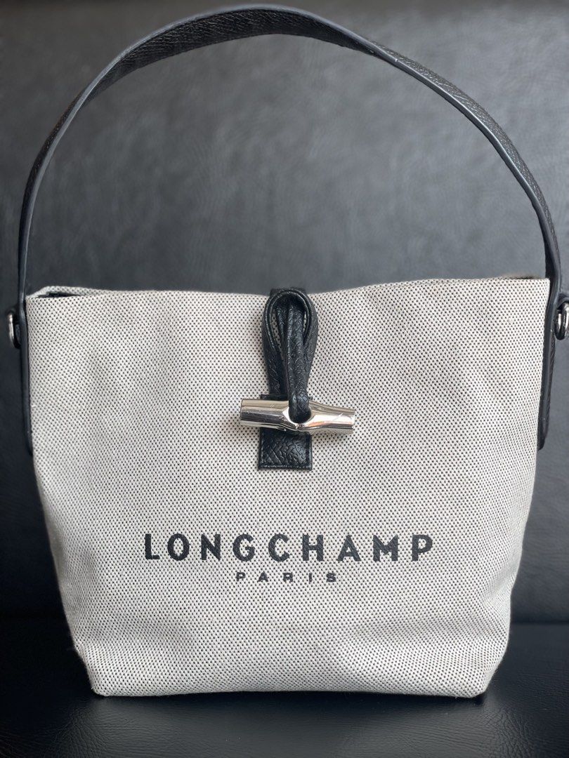 Longchamp Paris Handbag (Category: Luxury Bags & Wallets) located in Manila. Submitted by walter_wt (Listing ID 1424764905, Image 3). Description: Longchamp Roseau Canvas & Leather Bucket Bag in Metallic | -Condition rate: 9/10 .