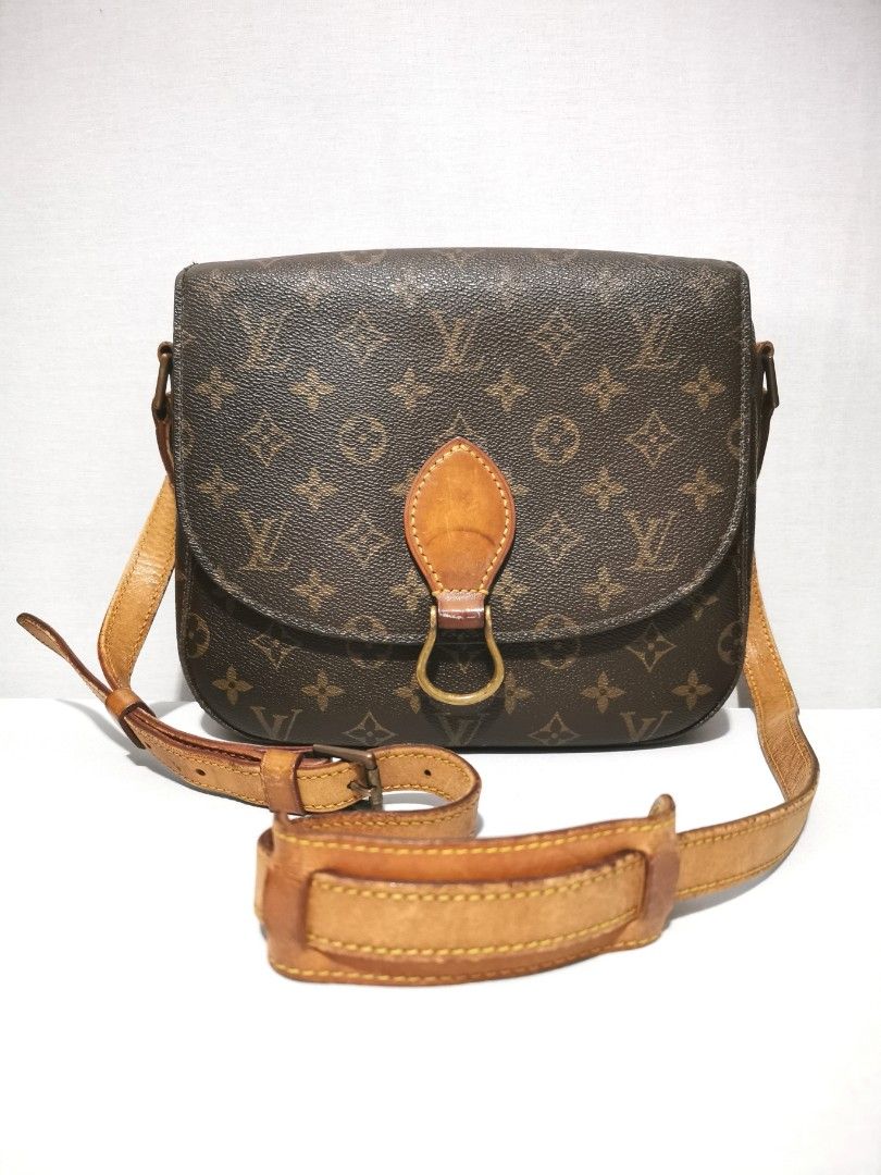 Authentic Louis Vuitton Shoulder Bag Monogram Saint Cloud (Category: Luxury Bags & Wallets) located in Cavite. Submitted by lensza_studio (Listing ID 1424873846, Image 1). Description: Vintage condition Pre-date code (approx 1982-1990) General signs of usage Crossbody strap - wear and cracks Outside pocket - damaged lining Interior zip pocket - damaged lining Inner lining- scratches, penmark Bottom edges-scuffings 25W 21H 8D cm No inclusions..