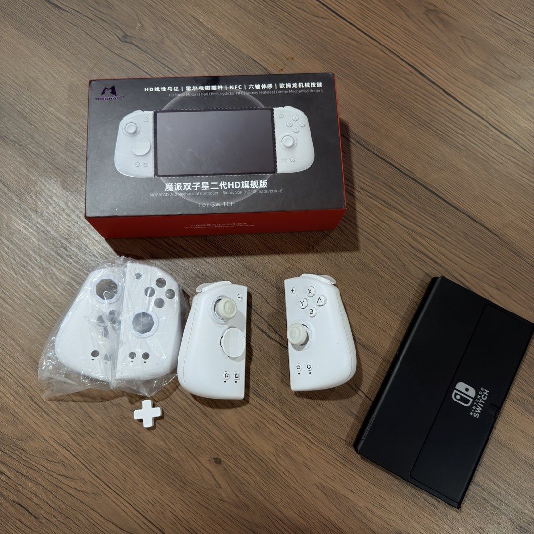Mecool HD Controller for Nintendo Switch (Category: Controllers) located in Valenzuela. Submitted by gearpandaph (Listing ID 1424833508, Image 1). Description: 🔥 FOR SALE: Mobapad M6 HD (WHITE) – COMPLETE SET! 🔥 Mga ka-gamer! 🎮 Upgrade your gaming experience with this Mobapad M6 HD (White) – perfect for serious and competitive players! ✅ Complete with box ✅ With extra accessories ✅ Well taken care of ✅ Smooth and responsive controls ✅ Solid bu