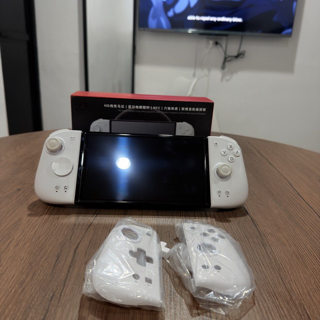 Mecool HD Controller for Nintendo Switch (Category: Controllers) located in Valenzuela. Submitted by gearpandaph (Listing ID 1424833508, Image 2). Description: 🔥 FOR SALE: Mobapad M6 HD (WHITE) – COMPLETE SET! 🔥 Mga ka-gamer! 🎮 Upgrade your gaming experience with this Mobapad M6 HD (White) – perfect for serious and competitive players! ✅ Complete with box ✅ With extra accessories ✅ Well taken care of ✅ Smooth and responsive controls ✅ Solid bu