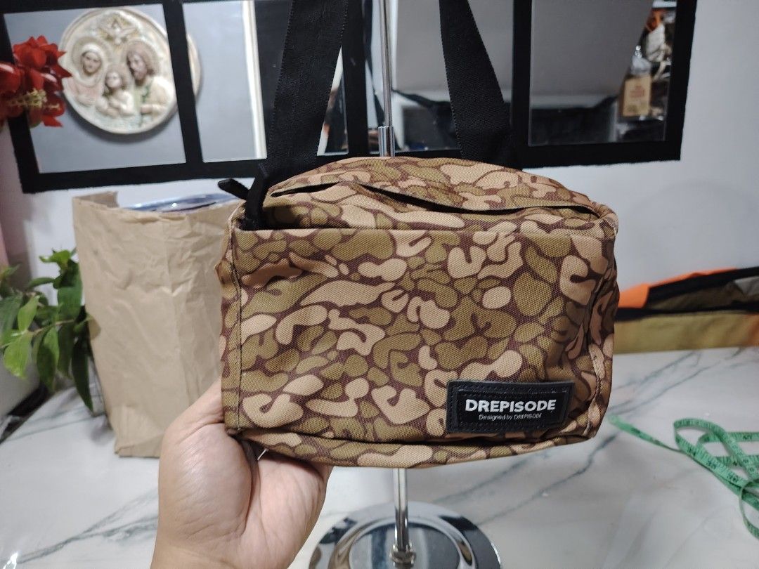 Mens belt bag (Category: Belt bags, Clutches and Pouches) located in Manila. Submitted by drxx.drip_19 (Listing ID 1424818476, Image 1). Description: - Preloved men's belt bag - Unique camo design - Stylish and practical - Perfect for everyday use.