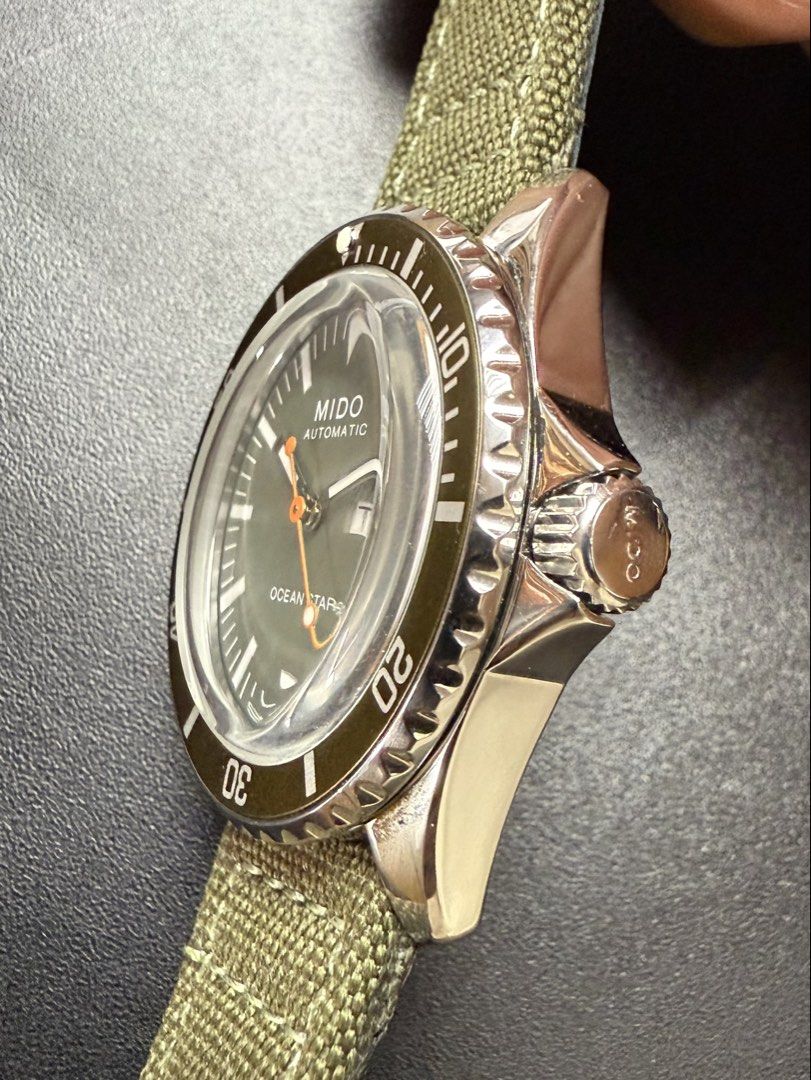 Mido Ocean Star Tribute (Category: Luxury Watches) located in Makati City. Submitted by pgr123321 (Listing ID 1424768678, Image 3). Description: MIDO OCEAN STAR TRIBUTE Reference No.: M026.830.18.091.00 Case: 40.5mm diameter x 13.4mm height - stainless steel, polished - unidirectional rotating bezel with aluminium insert - box sapphire crystal - screwed crown and caseback - 200m water-resistant Dial: Matte dial, in khaki green - printed indexes w