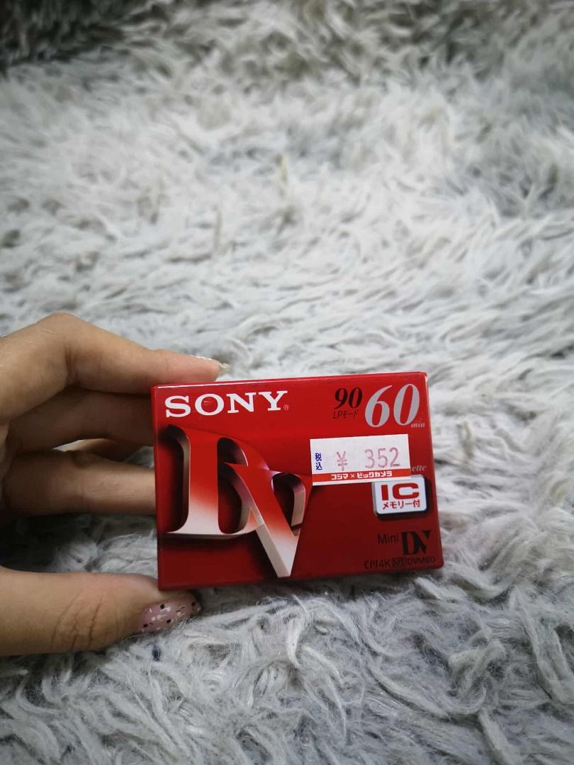 Mini Digital Video Cassette (Category: Portable Audio Accessories) located in Santa Cruz. Submitted by jmy_surplus.2 (Listing ID 1424727686, Image 1). Description: Size ; L - 5 W - 7 Color ; Red Type ; Cassette Brand ; No brand Material ; Style ; Digital Video Cassette LG 81 JMY 5 Batch #191.