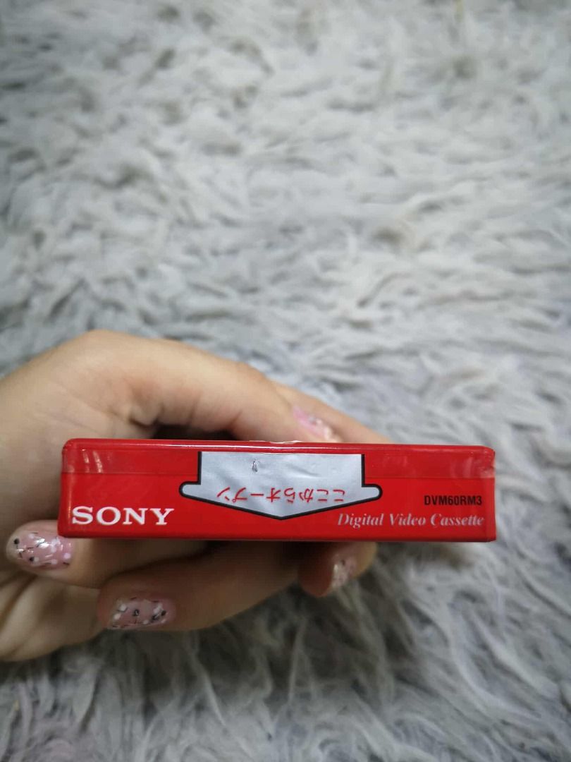 Mini Digital Video Cassette (Category: Portable Audio Accessories) located in Santa Cruz. Submitted by jmy_surplus.2 (Listing ID 1424727686, Image 2). Description: Size ; L - 5 W - 7 Color ; Red Type ; Cassette Brand ; No brand Material ; Style ; Digital Video Cassette LG 81 JMY 5 Batch #191.