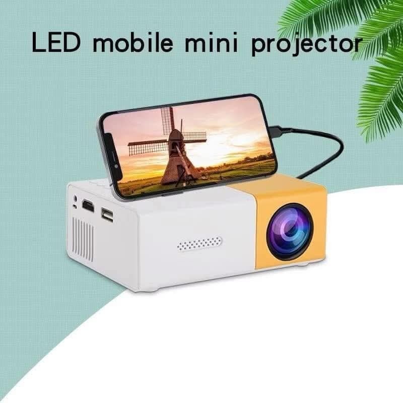 Mini LED Projector - Portable Home Theater (Category: Projectors) located in Mandaluyong City. Submitted by shopmla (Listing ID 1424819972, Image 2). Description: Mini Projector Php 880. Portable LED Mini Projector Mini Home Theater HDMI Mini Projector HD 1080P Compact and portable LED projector for home entertainment. Supports 1080P resolution with 600 lumens brightness and a 80" display. Features multiple input options including HDMI, USB, and 