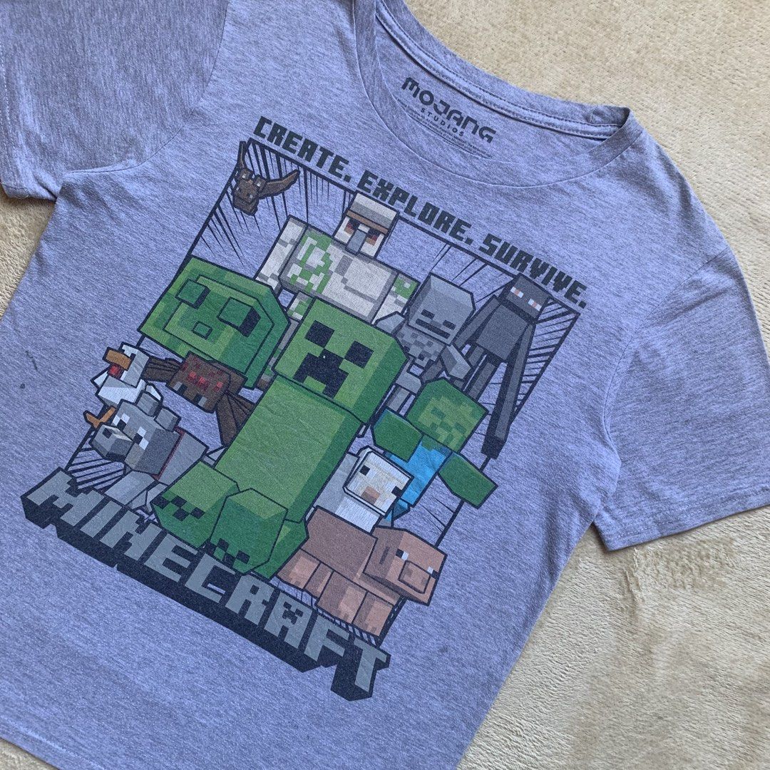 Mojang Minecraft tee (Category: Tshirts & Polo Shirts ) located in Guagua. Submitted by thethrift.verse.exe (Listing ID 1424765079, Image 2). Description: Length: 24 Width: 17 washable stain, minimal hairlines color rate: 10/10 condition: 9/10.