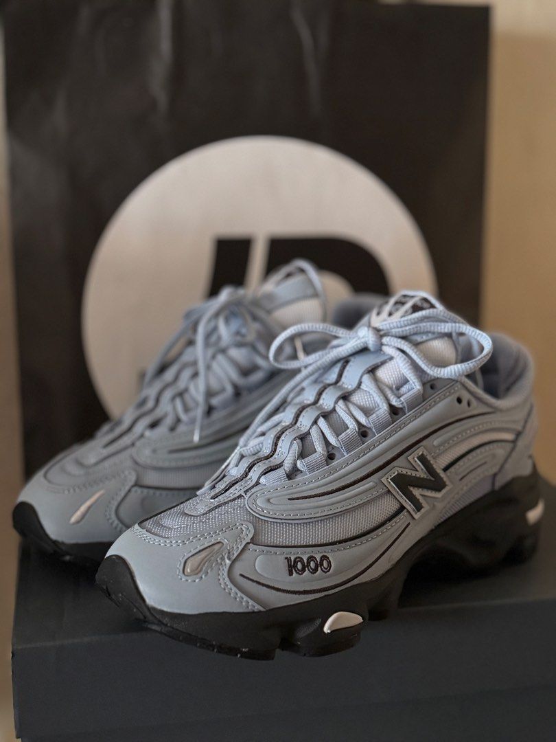 New Balance 1000 Blue Sneakers (Category: Sneakers) located in Manila. Submitted by elohenceee (Listing ID 1424797400, Image 2). Description: Used only once Impulse buy limited edition in JD sports Unique so pretty in person Orig price PHP 9,495 RFS: need medical funds.