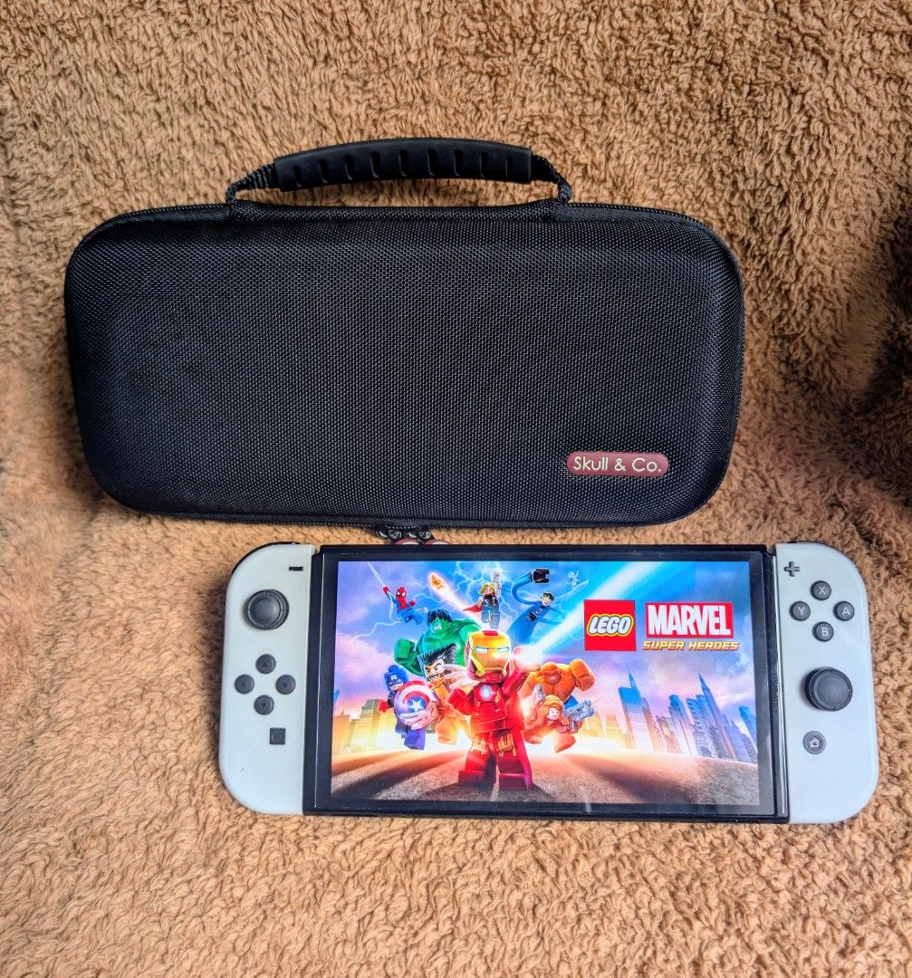 Nintendo Switch Oled with Free Games (Category: Nintendo) located in Manila. Submitted by nswitchgear (Listing ID 1424857438, Image 3). Description: Nintendo Switch OLED with Free Games ₱10,999 FREE acess to my Paid games Legit purchase not Jailbreak. Used item but in Good/Best condition Can give 7 Days personal Warranty for peace of mind. -Doon po tayo sa kaya tayong issupport, dont settle for less. Comes w/ Complete Package with pouch (Box,char