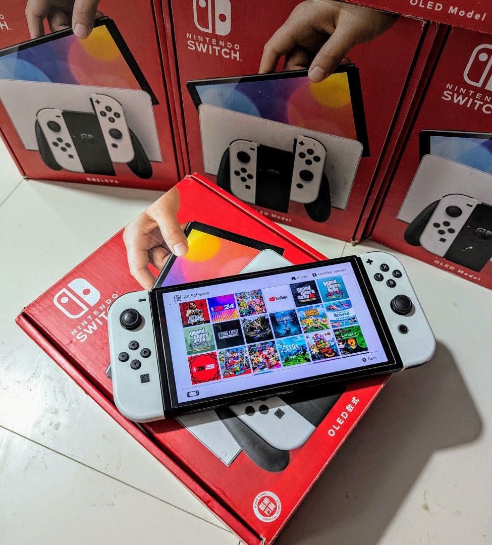Nintendo Switch OLED with Free Games (Category: Nintendo) located in Manila. Submitted by nswitchgear (Listing ID 1424858603, Image 2). Description: Nintendo Switch OLED Redblue with Free Games ₱10,999 FREE acess to my Paid games Legit purchase not Jailbreak. Used item but in Good/Best condition Can give 7 Days personal Warranty for peace of mind. -Doon po tayo sa kaya tayong issupport, dont settle for less. Comes w/ Complete Package with pouch (