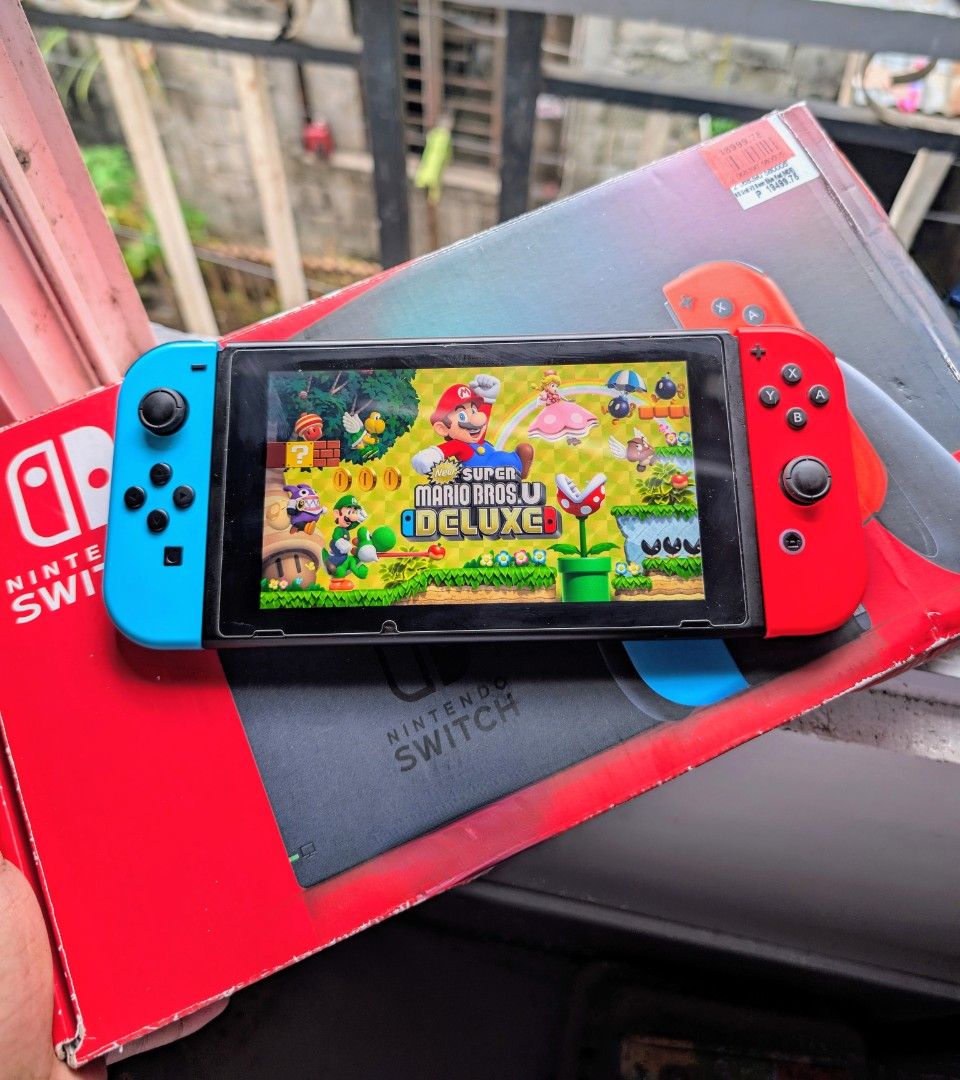 Nintendo Switch V2 with Free Games (Category: Nintendo) located in Manila. Submitted by nswitchgear (Listing ID 1424857245, Image 3). Description: Nintendo Switch V2 with Free Games ₱8,499 FREE acess to my Paid games Legit purchase not Jailbreak. Used item but in Good/Best condition Can give 7 Days personal Warranty for peace of mind. -Doon po tayo sa kaya tayong issupport, dont settle for less. Comes w/ Complete accessories and pouch (Charger,do