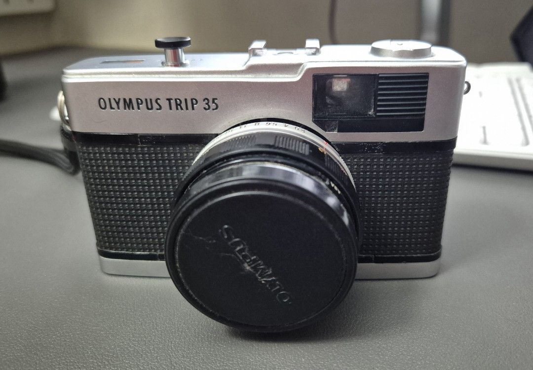 Olympus Trip 35 Film Camera (Category: Cameras) located in Angeles City. Submitted by dps733 (Listing ID 1424707232, Image 1). Description: still works from last use good lens no haze comesnwith lens filter current issue - loose lens, needs repair.