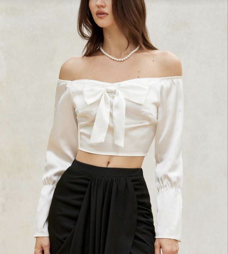 Preloved Satin Look White Off Shoulder (Category: Blouses) located in Angeles City. Submitted by hemeli (Listing ID 1424742172, Image 2). Description: Preloved. Good as new. See original price and when worn on the photos Size: xs to small Wore once for Year End party :) Location: Angeles City and Makati City (Weekend) .