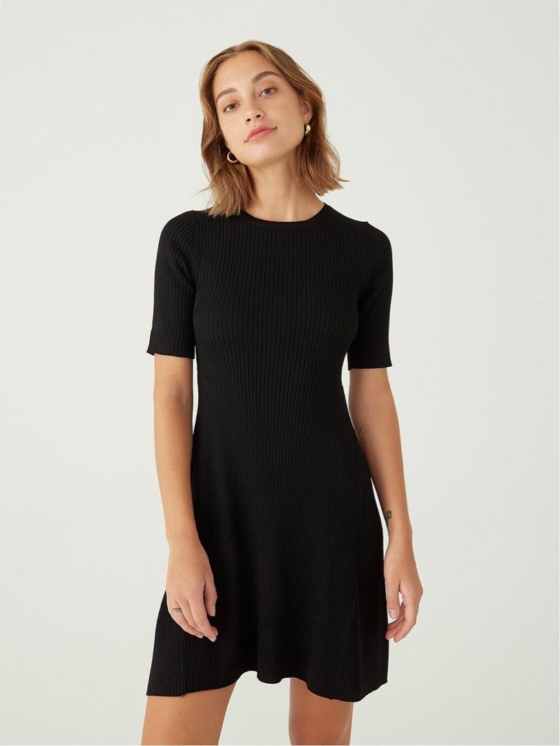 Rays Denim Ribbed Dress - Black - Size M (Category: Dresses) located in Mansalay. Submitted by declutterandco (Listing ID 1424799859, Image 1). Description: - Rays Denim black dress - Size M - Ribbed texture - A-line silhouette - Short sleeves - Round neckline - Versatile for various occasions - Comfortable, stretchy fabric.