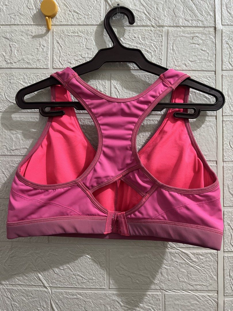Reebok Sports Bra - Pink (Category: Activewear) located in General Santos City (Dadiangas). Submitted by bvbthrifts (Listing ID 1424849327, Image 2). Description: -Reebok sports bra in pink - Size: M - Features a racerback design and a hook-and-eye closure at the back - The bra has a padded design for support - Very good condition RFS: Decluttering.