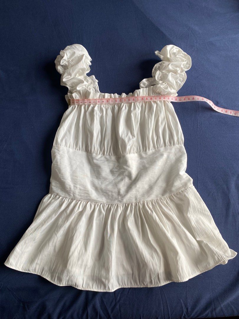 Ruffled Cute White Babydoll Peplum Top (Category: Others Tops) located in Pasay City. Submitted by lovedby.mmm (Listing ID 1424763560, Image 2). Description: ۶ৎ bought from pratunam market @ bangkok, thailand ۶ৎ stretchable material, fits xs-s ۶ৎ super cute, perfect for cafe/mall dates, ootd, school · · ─ ·ʚɞ· ─ · · ۶ৎ mop: gcash ۶ৎ mod: same day delivery (lalamove/grab) tags: brandy melville isa the label phia the label edikted shushi clothing h