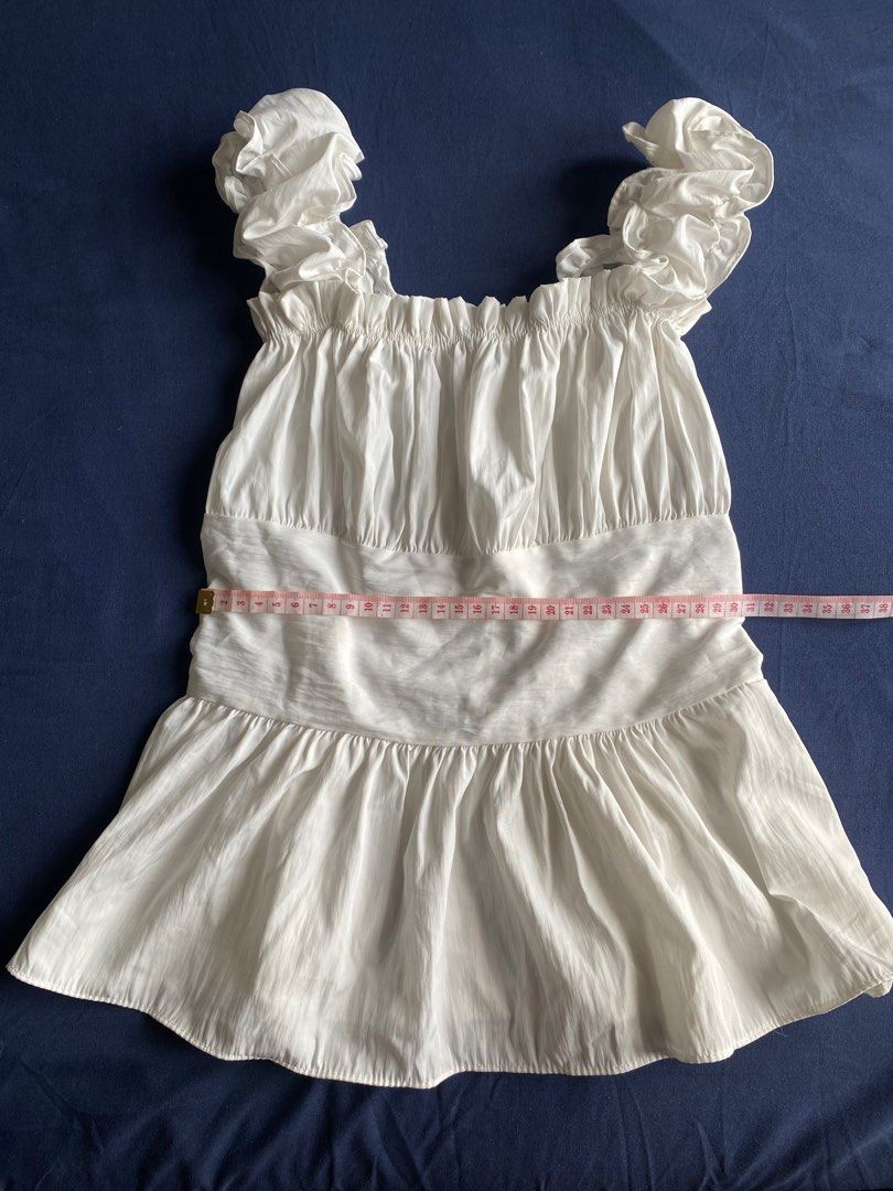 Ruffled Cute White Babydoll Peplum Top (Category: Others Tops) located in Pasay City. Submitted by lovedby.mmm (Listing ID 1424763560, Image 3). Description: ۶ৎ bought from pratunam market @ bangkok, thailand ۶ৎ stretchable material, fits xs-s ۶ৎ super cute, perfect for cafe/mall dates, ootd, school · · ─ ·ʚɞ· ─ · · ۶ৎ mop: gcash ۶ৎ mod: same day delivery (lalamove/grab) tags: brandy melville isa the label phia the label edikted shushi clothing h