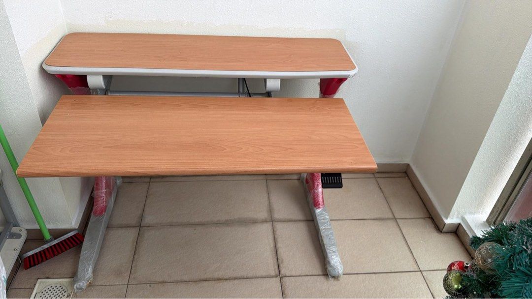 Study table (Category: Tables & Sets) located in Singapore. Submitted by kimkimmmmm (Listing ID 1424706396, Image 1). Description: Study table with adjustable height.