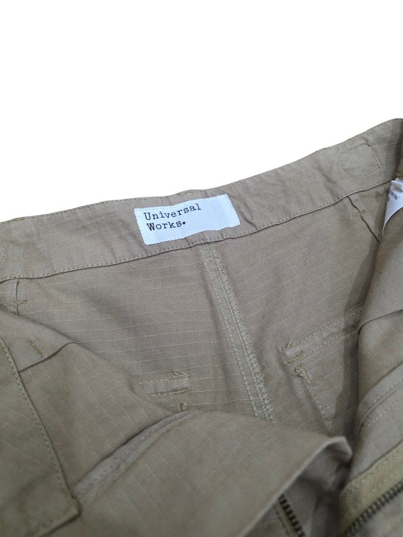 Universal Works Peacenik Pants (Sand heavy ripstop) (Category: Trousers) located in Angeles City. Submitted by recyclecenter (Listing ID 1424831211, Image 3). Description: Universal Works Peacenik Pant (Sand Heavy Ripstop) Size 30 *actual color differs a bit from the photo posted. Sandy light brown color* Inspired by classic Military 'Cargo Pants' with a fresh fit, the 'Peacenik Pant' is a fatigue-style trouser with a panel insert and extra front