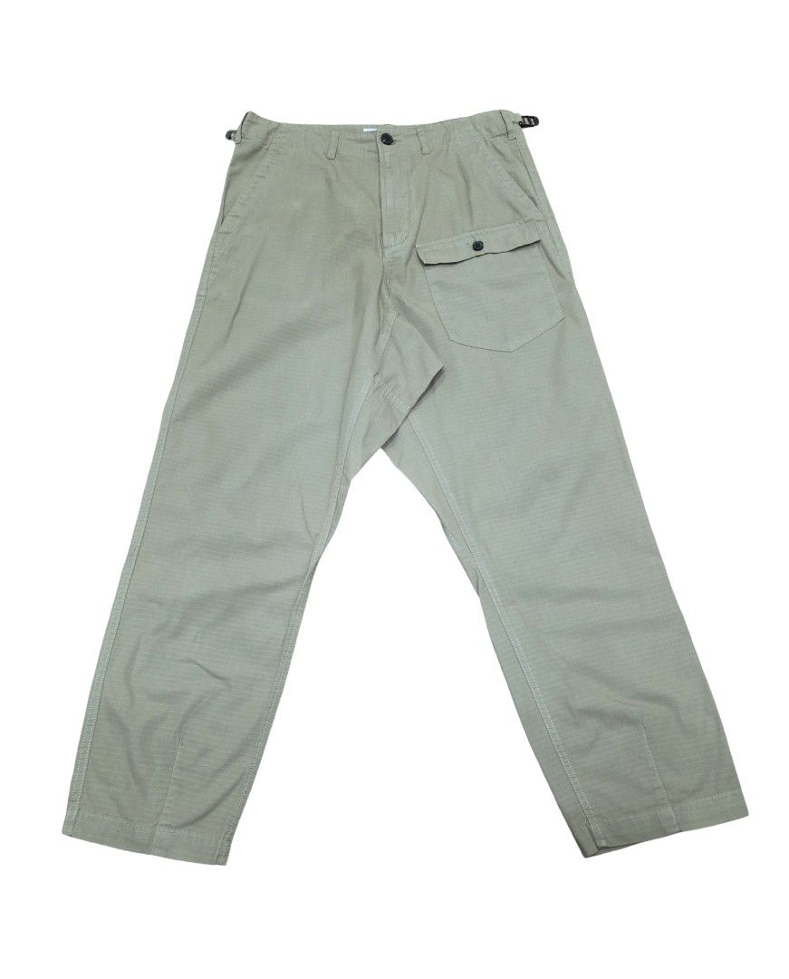 Universal Works Peacenik Pants (Sand heavy ripstop) (Category: Trousers) located in Angeles City. Submitted by recyclecenter (Listing ID 1424831211, Image 1). Description: Universal Works Peacenik Pant (Sand Heavy Ripstop) Size 30 *actual color differs a bit from the photo posted. Sandy light brown color* Inspired by classic Military 'Cargo Pants' with a fresh fit, the 'Peacenik Pant' is a fatigue-style trouser with a panel insert and extra front