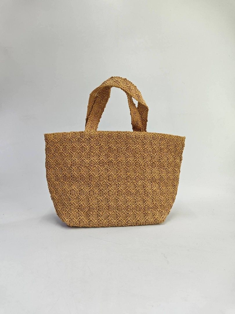 👑VIP Dior Woven Tote Bag mini (Category: Luxury Bags & Wallets) located in Quezon City. Submitted by elegantephbycharlie (Listing ID 1424758318, Image 3). Description: Woven tote bag features the Dior logo embroidered on the front. It has two top handles and a spacious interior. The bag is made of a woven material and has a light brown color. The interior lining is a light pink color. It is a stylish and practical accessory..