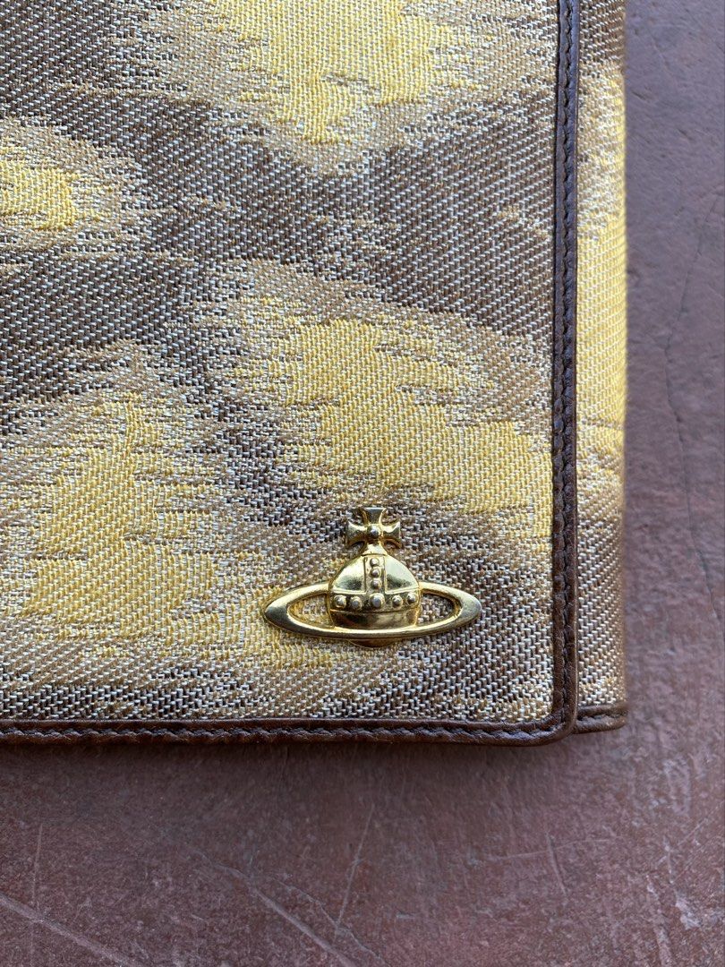 Vivienne Westwood Wallet (Category: Luxury Bags & Wallets) located in Manila. Submitted by lacsonmike (Listing ID 1424713648, Image 2). Description: For sale: Vivienne Westwood Wallet -has multiple compartments -no issue (see detailed photos for reference) ₱1,650 + sf Available thru shipping or rider delivery Send a message for inquiries! 📲.