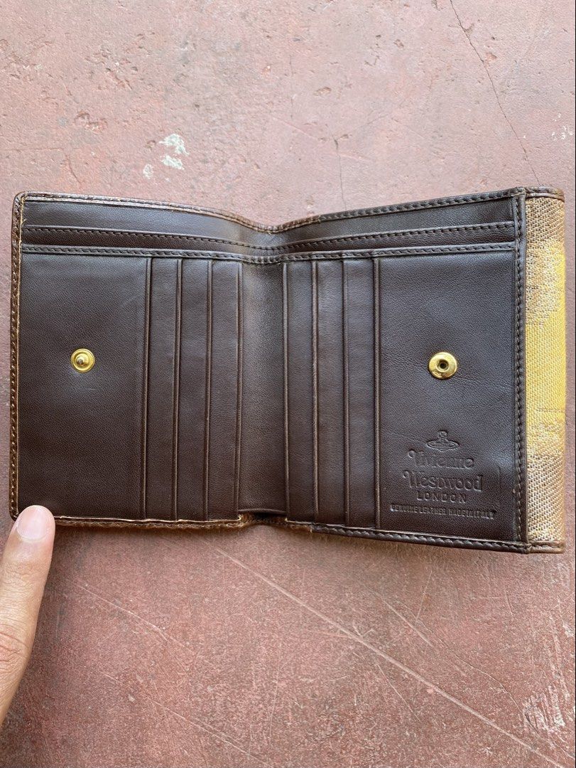 Vivienne Westwood Wallet (Category: Luxury Bags & Wallets) located in Manila. Submitted by lacsonmike (Listing ID 1424713648, Image 3). Description: For sale: Vivienne Westwood Wallet -has multiple compartments -no issue (see detailed photos for reference) ₱1,650 + sf Available thru shipping or rider delivery Send a message for inquiries! 📲.