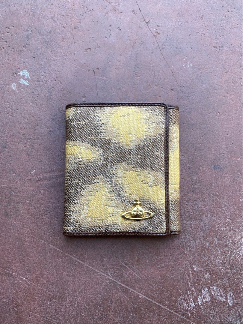 Vivienne Westwood Wallet (Category: Luxury Bags & Wallets) located in Manila. Submitted by lacsonmike (Listing ID 1424713648, Image 1). Description: For sale: Vivienne Westwood Wallet -has multiple compartments -no issue (see detailed photos for reference) ₱1,650 + sf Available thru shipping or rider delivery Send a message for inquiries! 📲.