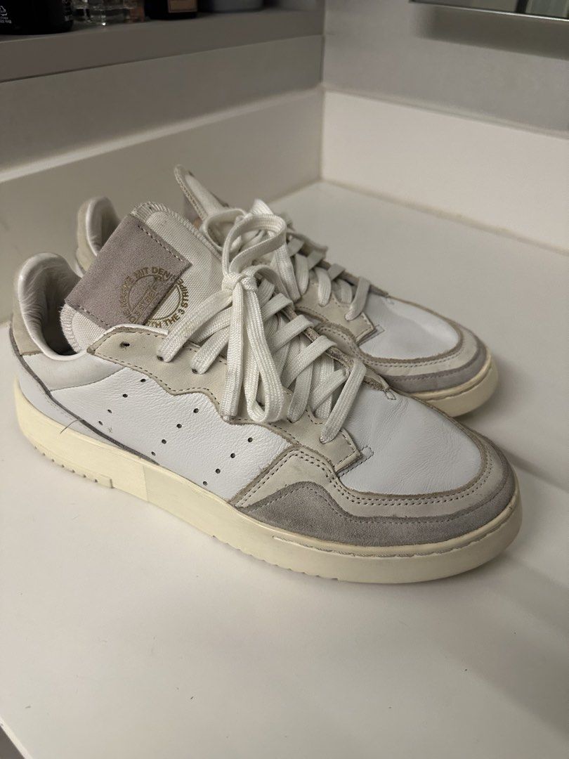 Adidas supercourt shoes (Category: Sneakers) located in Makati City. Submitted by rms24601 (Listing ID 1424964070, Image 3). Description: Color: Crystal White / Chalk White / Off White Size: 8.5US men Used 5x only Purchased and worn only in UK.