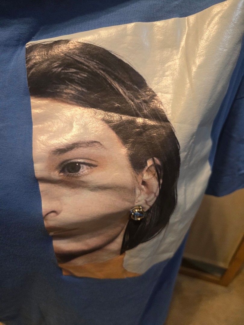 Blue Graphic Print T-shirt (Category: Tshirts & Polo Shirts ) located in Pasig City. Submitted by leildyne (Listing ID 1424980667, Image 3). Description: Blue t-shirt features a graphic print on the front. The shirt has short sleeves. The shirt is displayed on a mannequin..
