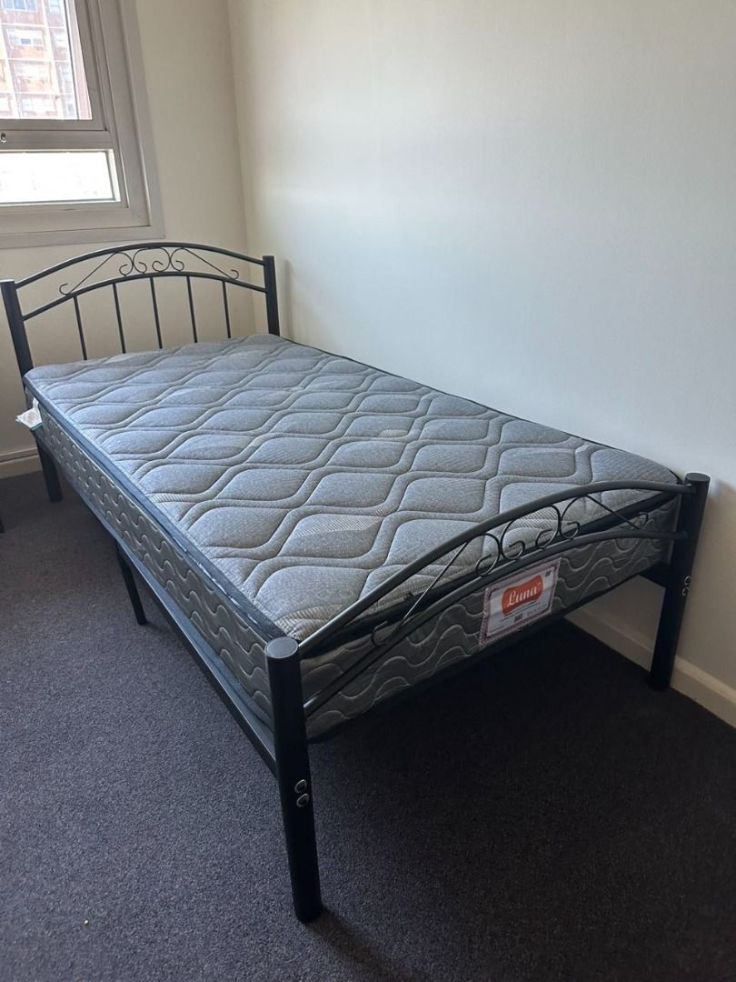 Cleveland Metal Bed Frame – Vintage Metal Design, Gloss Black Finish, Strong Steel Slats (Category: Furniture) located in Brisbane. Submitted by priceworth_brisbane (Listing ID 1424895063, Image 1). Description: Add timeless style to your bedroom with the Cleveland Metal Bed Frame. Designed with a classic vintage-inspired metal frame and gloss black finish, this bed offers both durability and elegance. Built from high-quality iron with strong sup