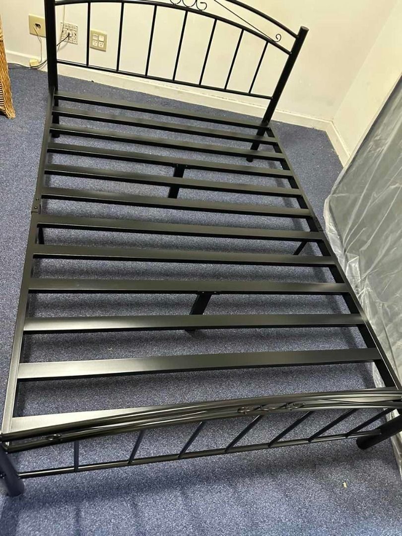 Cleveland Metal Bed Frame – Vintage Metal Design, Gloss Black Finish, Strong Steel Slats (Category: Furniture) located in Brisbane. Submitted by priceworth_brisbane (Listing ID 1424895063, Image 2). Description: Add timeless style to your bedroom with the Cleveland Metal Bed Frame. Designed with a classic vintage-inspired metal frame and gloss black finish, this bed offers both durability and elegance. Built from high-quality iron with strong sup