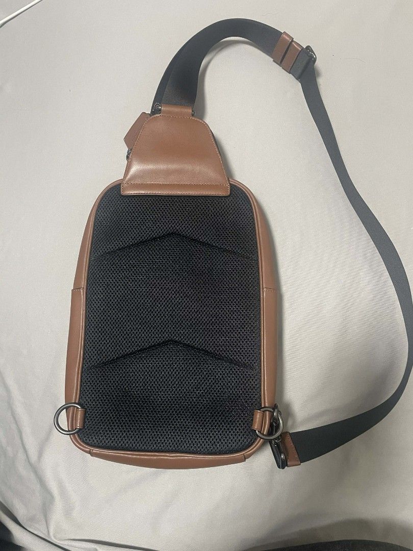 Coach Ethan Pack Sling Bag (Category: Sling Bags) located in Quezon City. Submitted by elkar (Listing ID 1424976810, Image 2). Description: authentic coach ethan pack sling bag in brown no flaws!! mint condition, just don't have the packaging na. recevied it as a gift a year ago but never used which is why i'm selling it now. this is from Coach Men's line but very classy on both girls & guys! perfect for a casual classy and clean look! dimensions
