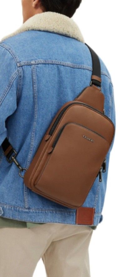 Coach Ethan Pack Sling Bag (Category: Sling Bags) located in Quezon City. Submitted by elkar (Listing ID 1424976810, Image 3). Description: authentic coach ethan pack sling bag in brown no flaws!! mint condition, just don't have the packaging na. recevied it as a gift a year ago but never used which is why i'm selling it now. this is from Coach Men's line but very classy on both girls & guys! perfect for a casual classy and clean look! dimensions